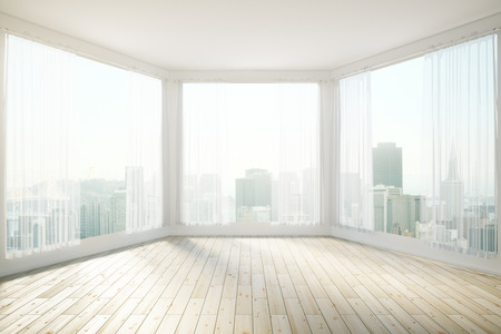 Sunlit interior design with panoramic windows revealing city view. 3D Renderingの写真素材