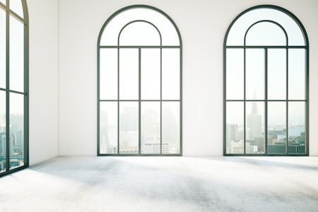 Concrete white interior with three large windows and city view. 3D Renderingの写真素材
