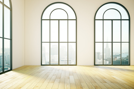 Unfurnished interior design with tall windows and wooden floor. 3D Renderingの写真素材