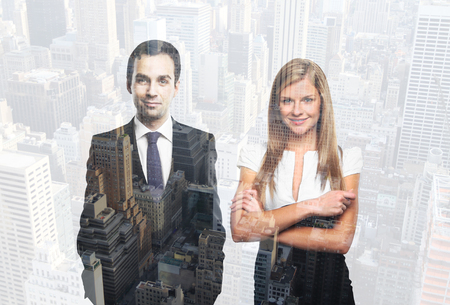 Two happy successful businesspeople on city background. Double exposureの写真素材
