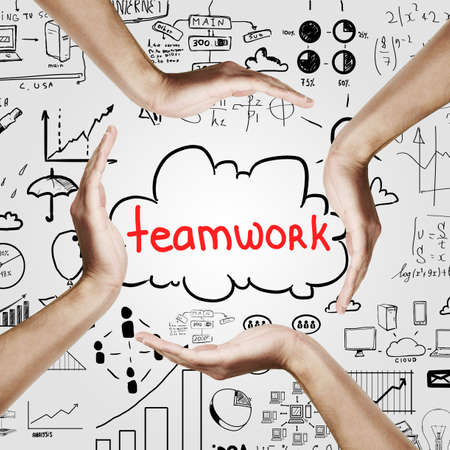 Team work concept with hands forming circle around cloud with teamwork text on light background with business drawingsの写真素材