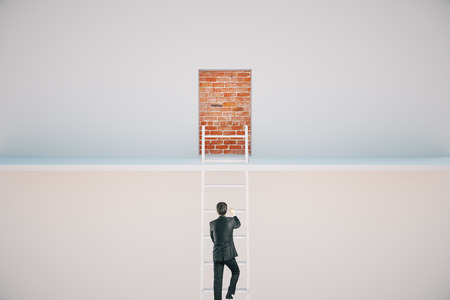 Businessman climbing ladder to escape from prison. Freedom conceptの写真素材