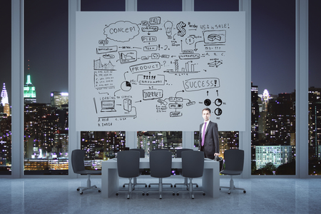 Conference room interior with businessman standing next to business sketch on whiteboard. Illuminated night city in the background. Success concept. 3D Renderingの写真素材