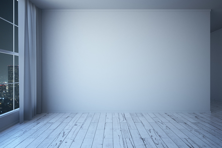 Side view of white minimalistic interior with wooden floor, blank concrete wall, window with night city view and curtains. Mock up, 3D Renderingの写真素材