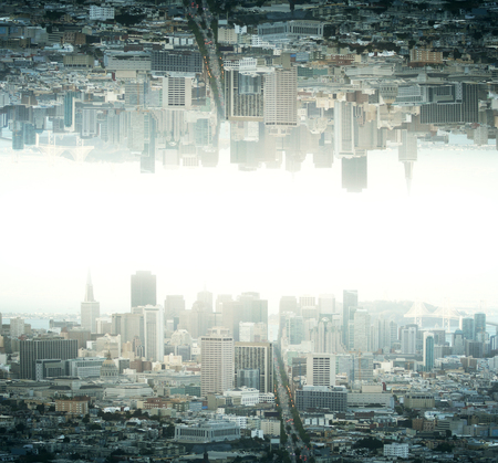 Abstract reflected upside down city on light backgrounf
