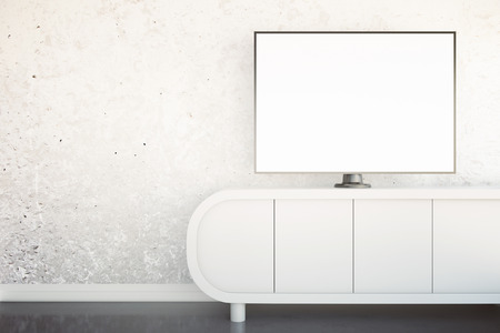 Front view of light tv stand with blank white TV screen in interior with concrete wall and shiny floor. Mock up, 3D Renderingの写真素材