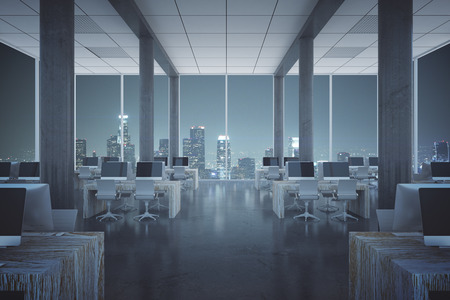 Modern coworking office interior with illuminated night city view. 3D Renderingの写真素材
