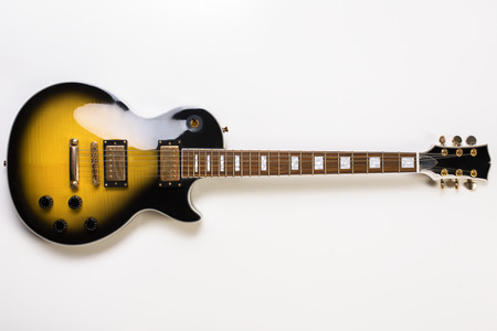 Top view of electric sunburst guitar on white background. Full lengthの写真素材