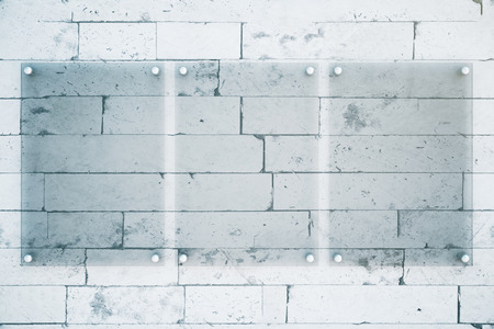 Front view of three blank glass plates on brick wall background. Mock up, 3D Renderingの写真素材