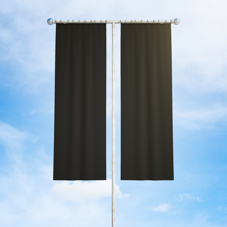 Front view of black cloth banner on bright blue sky background. Mock up, 3D Renderingの写真素材