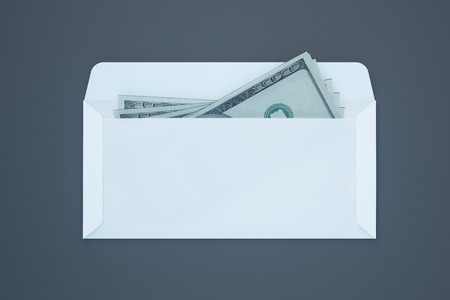 Dollar banknotes inside white envelope on dark grey background. Bribery and corruption concept. 3D Renderingの写真素材