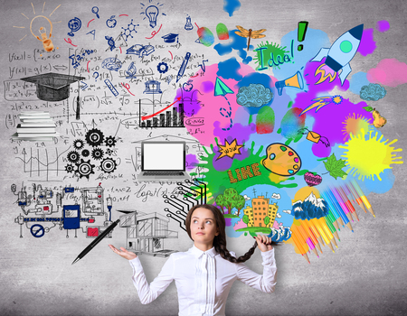Creative and analytical thinking concept. Confused girl with colorful sketch on concrete backgroundの写真素材