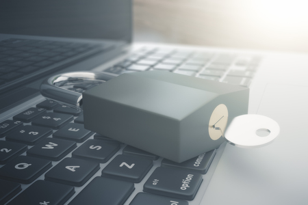 Close up of laptop keyboard with key and lock. Security concept. 3D Renderingの写真素材