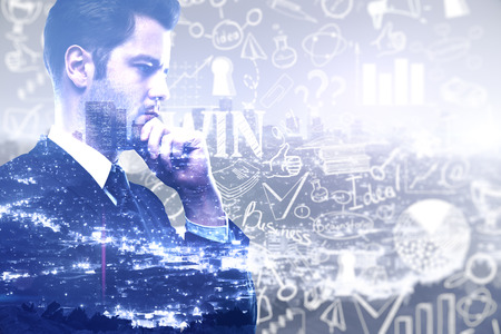 Businessman with business sketch on blue city background. Success concept,  Double exposureの写真素材
