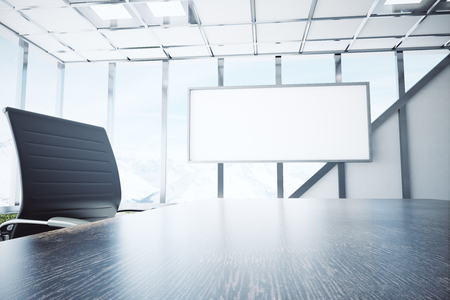 Close up of wooden desk and chair in office interior with empty whiteboard and daylight. Mock up, 3D Renderingの写真素材