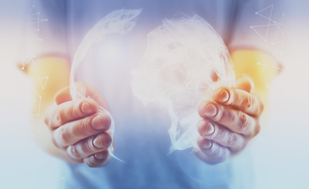 Close up of male hands holding abstract globe on bright background. Global business technologies conceptの写真素材