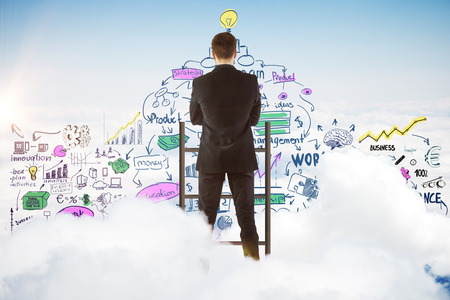 Back view of young businessman standing on top of ladder. Sky background with business sketch. Idea conceptの写真素材