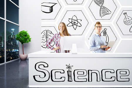 Young male and female workers at hospital reception with drawings in interior with night city view. Science concept. 3D Renderingの写真素材