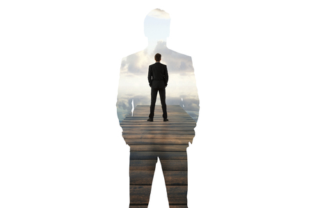 Back view of thoughtful businessman standing on wooden pier. Research concept. Double exposureの写真素材