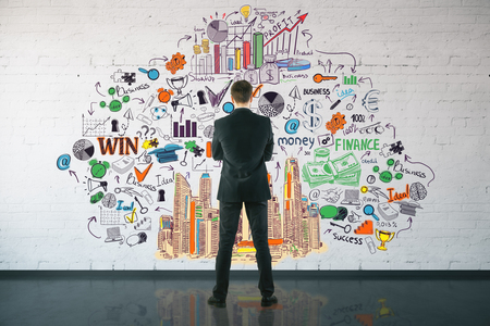 Back view of young businessman looking at wall with business sketch. Win concept. 3D Renderingの写真素材