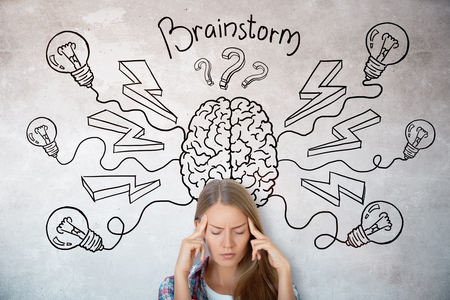 Pensive young woman on concrete background with abstract brain sketch. Brainstorm and innovation...