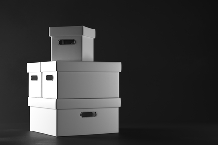 Stacks of white boxes on dark background. Container concept. 3D Renderingの写真素材