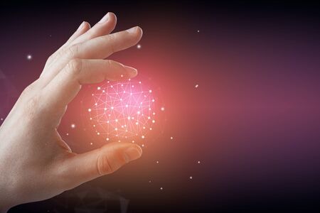 Hand holding abstract polygonal globe. Network concept. 3D Renderingの写真素材