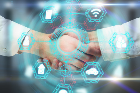 Side view and close up of handshake with abstract digital business network hologram. Teamwork and...