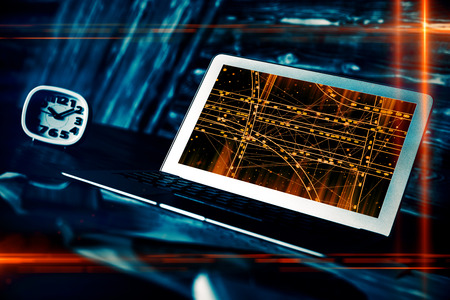 Side view of modern workplace with car network on laptop computer screen and clock. App concept. Double exposureの写真素材