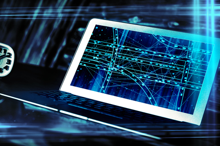 Side view of modern workplace with car network on laptop computer screen and clock. Navigation concept. Double exposureの写真素材