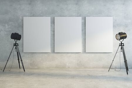 Concrete interior with professional lighting equipment and empty billboards on wall. Gallery, museum, exhibition concept. Mock up, 3D Renderingの写真素材