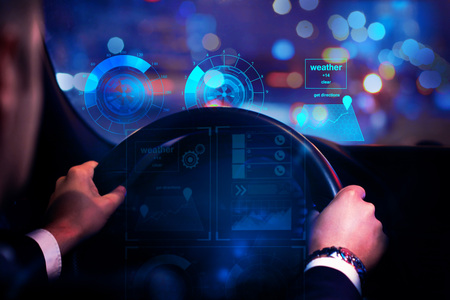Close up of businessman hands driving car with abstract glowing digital interface. Transportation and future concept. 3D Rendering の写真素材