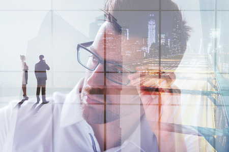 Portrait of handsome businessman on abstract city background. Occupation, lifestyle and employment concept. Double exposure の写真素材