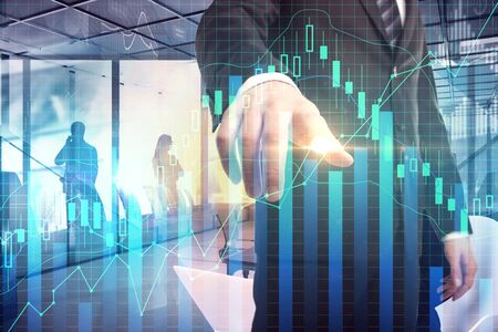 Investment and trade concept. Businessman pointing at forex chart on abstract city office...