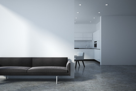 Modern concrete kitchen and living room interior with sunlight. 3D Rendering の写真素材