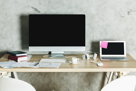 Modern designer desk top with clean laptop computer, supplies and various other objects. Close up, Mock upの写真素材