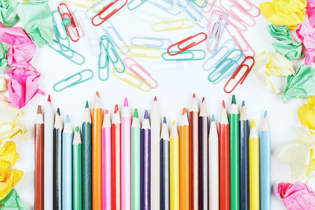 Top view of white office desk top with colorful supplies. Art, school and design conceptの写真素材