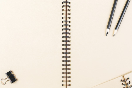 Top view of office desktop with notepad and copy space. Design and work place concept. Mock up 