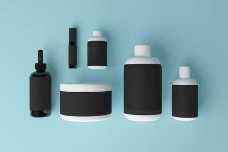 Blank black medicine containers on blue background. Medical,  drug, dosage and advertisement concept. Mock up, 3D Rendering の写真素材