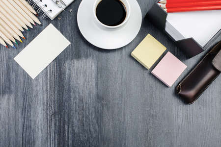 Modern wooden office workspace with supplies and copy space. Mock up, Above view and close up の写真素材