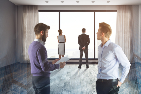 Businesspeople with document standing in modern interior with city view. Teamwork and success concept. Double exposure  の写真素材