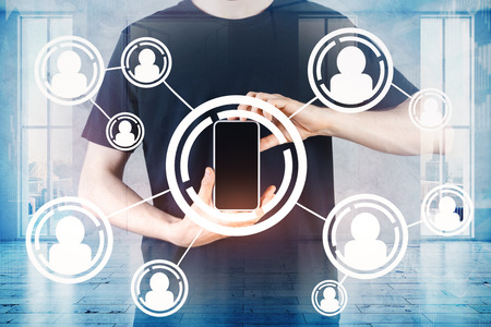 Hand holding cellphone with digital interface. Technology and communication concept. Double exposure...