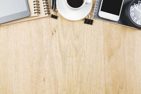 Top view of contemporary wooden office tabletop with supplies and copy space. Design and work place concept. Mock up の写真素材