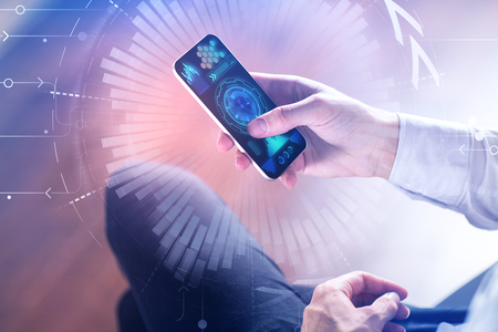 Businessman hands using cellphone with abstract forex diagram on blurry background. Profit and technology concept. Double exposure の写真素材