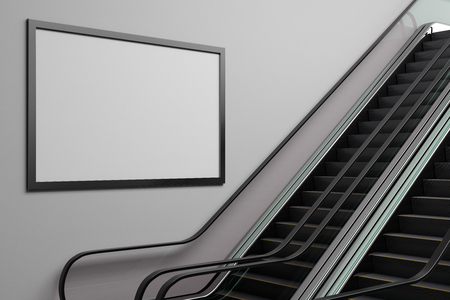 Silver escalator in concrete metro interior with empty ad billboard. Advertisement and retail concept. 3D Rendering の写真素材