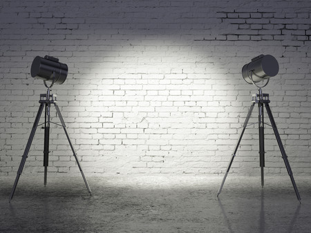 Minimalistic studio with blank brick wall and professional lighting equipment. Mock up, 3D Renderingの写真素材
