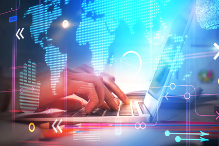 Close up of hands using laptop with digital business interface. Communication and hud concept....