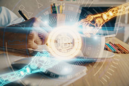 Cryptocurrency hologram, bitcoin, ico theme over hands taking notes background. Concept of blockchain. Multi exposureの写真素材