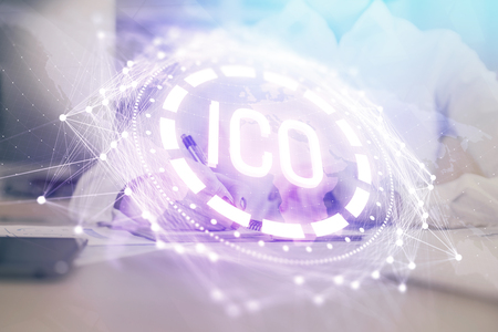 Cryptocurrency hologram, bitcoin, ico theme over hands taking notes background. Concept of blockchain. Multi exposureの写真素材