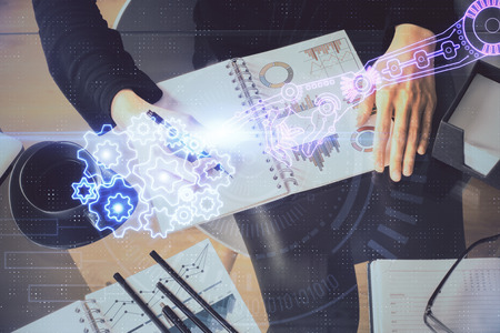 Multi exposure of womans writing hand on background with data technology hud. Big data concept.の写真素材